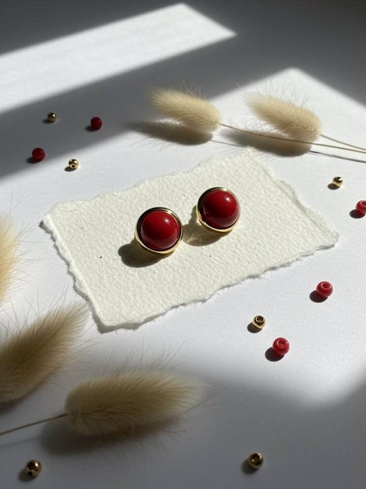 ARETES ROJO BORDE DORADO 14MM